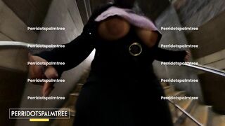 Perri walking down train platform stairs